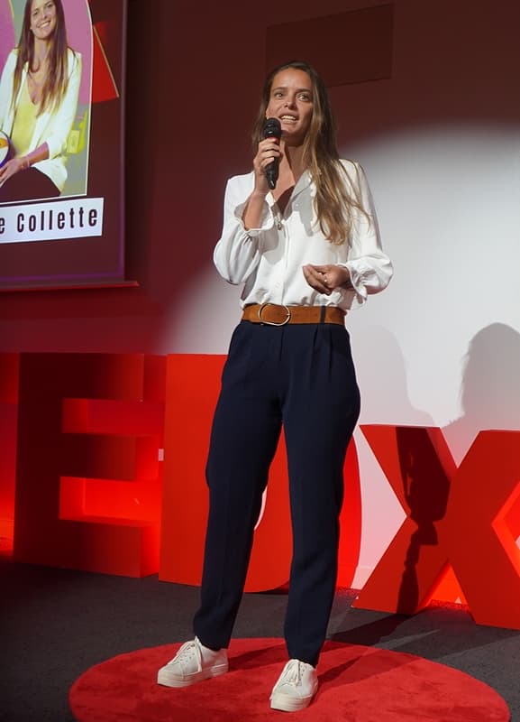 Celine speaking at an event
